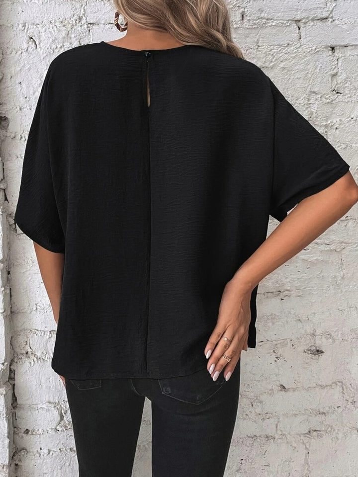 PRE-ORDER: Knotted Round Neck Half Sleeve Blouse