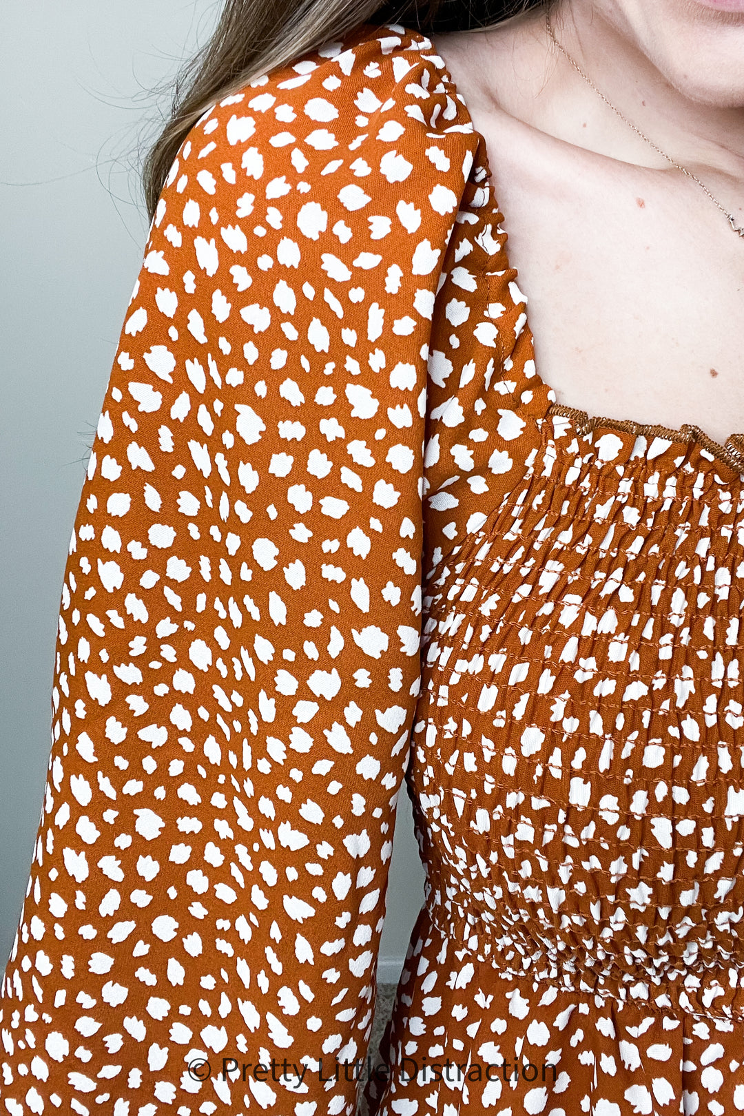 Rust Leopard Print Smocked Ruffle Hem Top