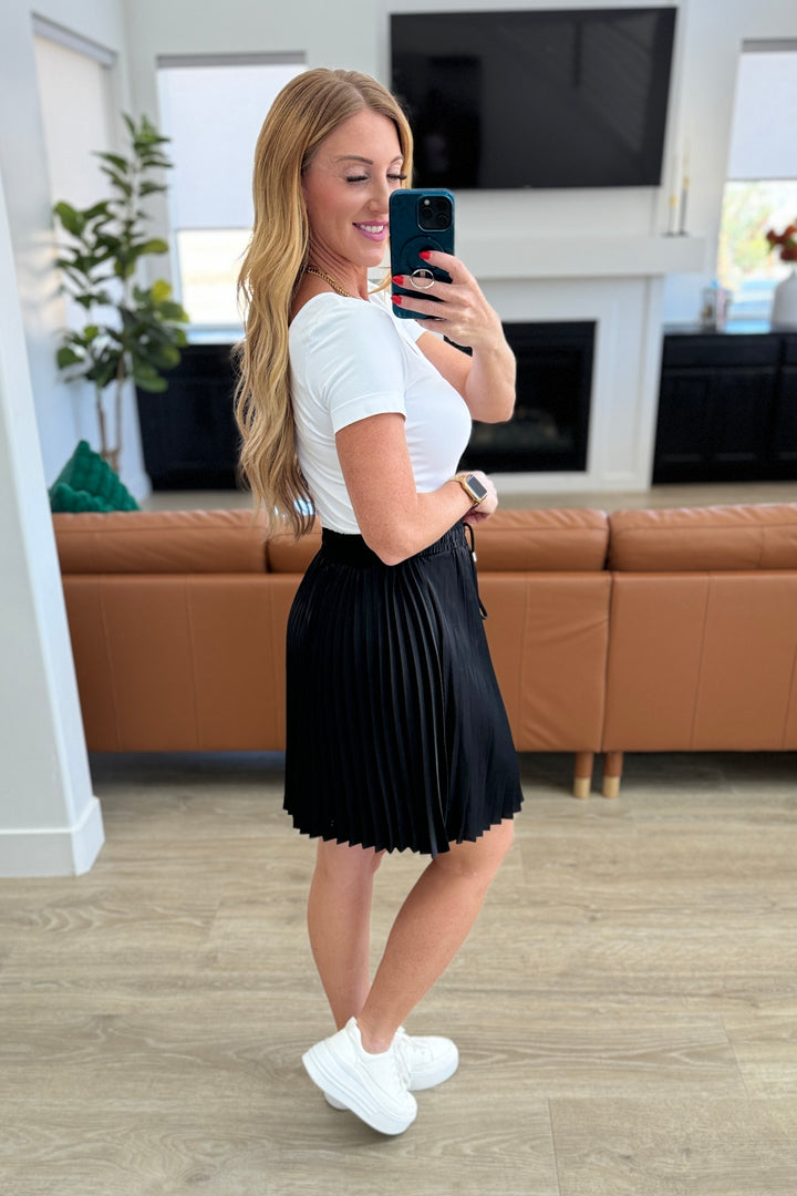 Just a Flirt Pleated Skirt in Black